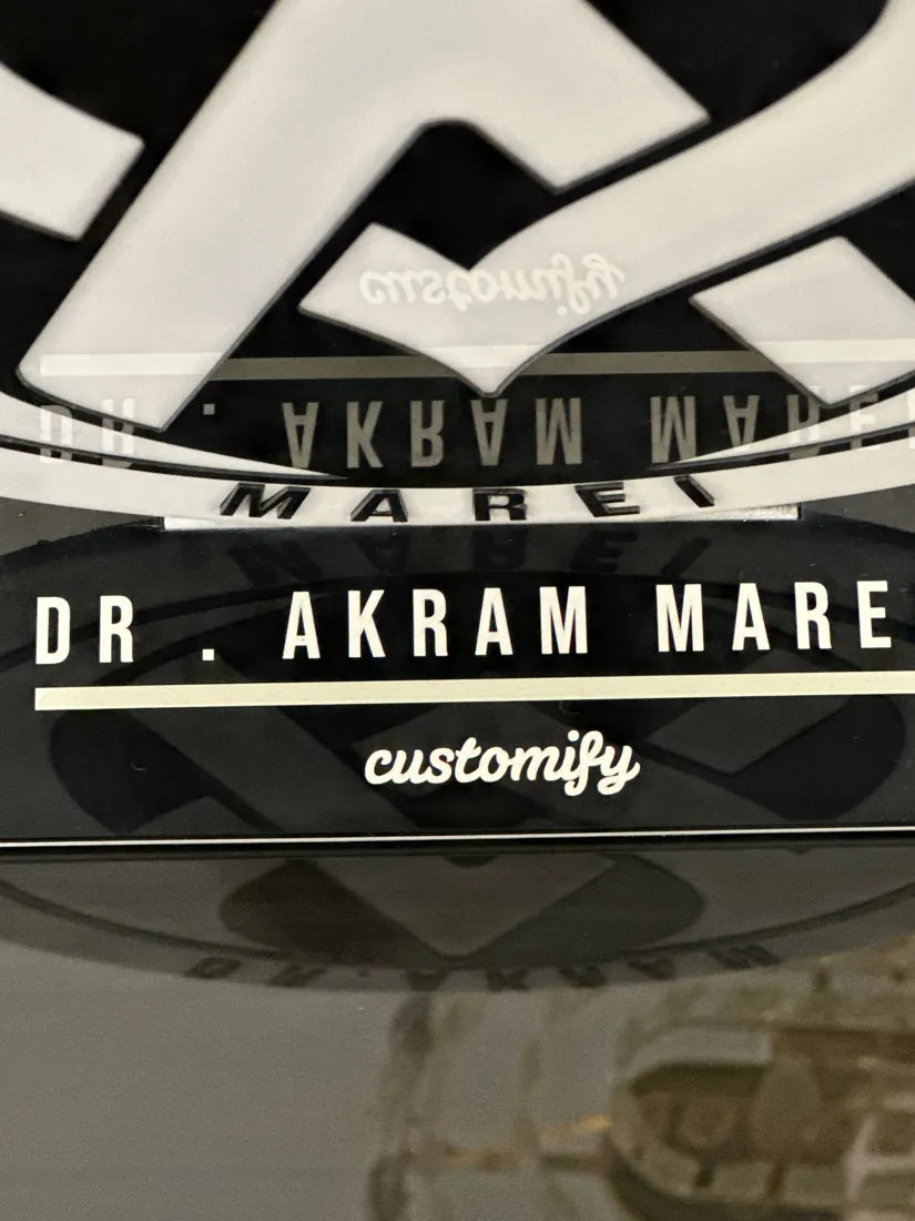Close-up of the laser-engraved name and customify signature