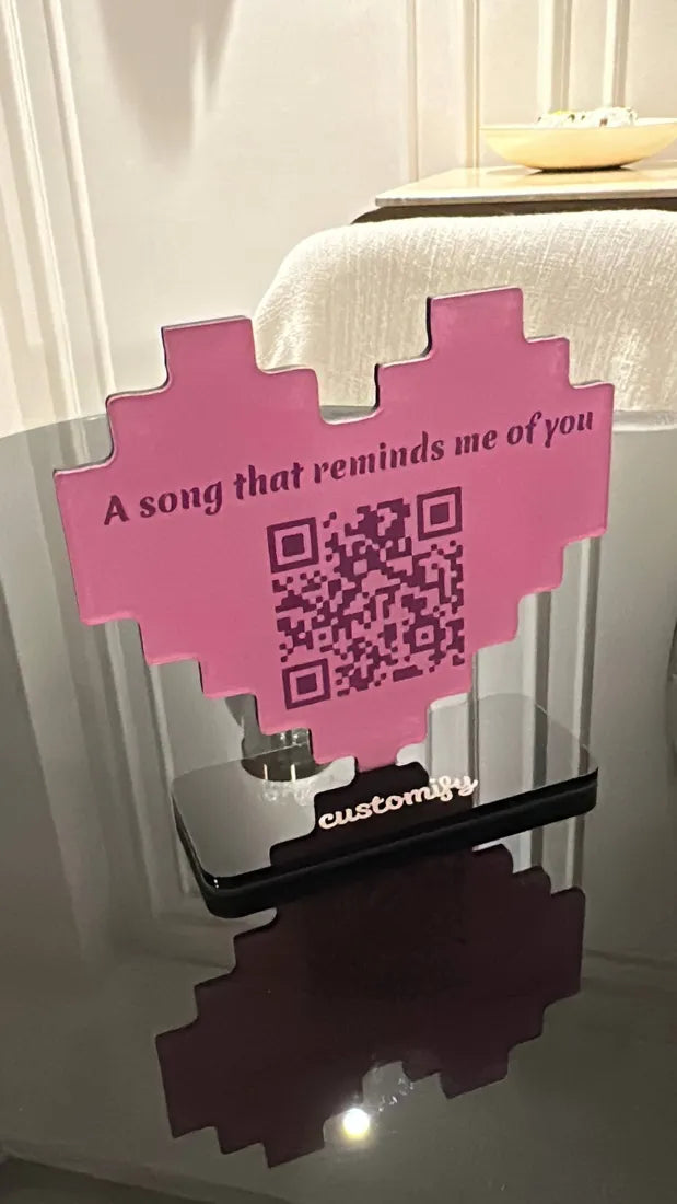 Pixel heart stand with a QR code — a song that reminds me of you